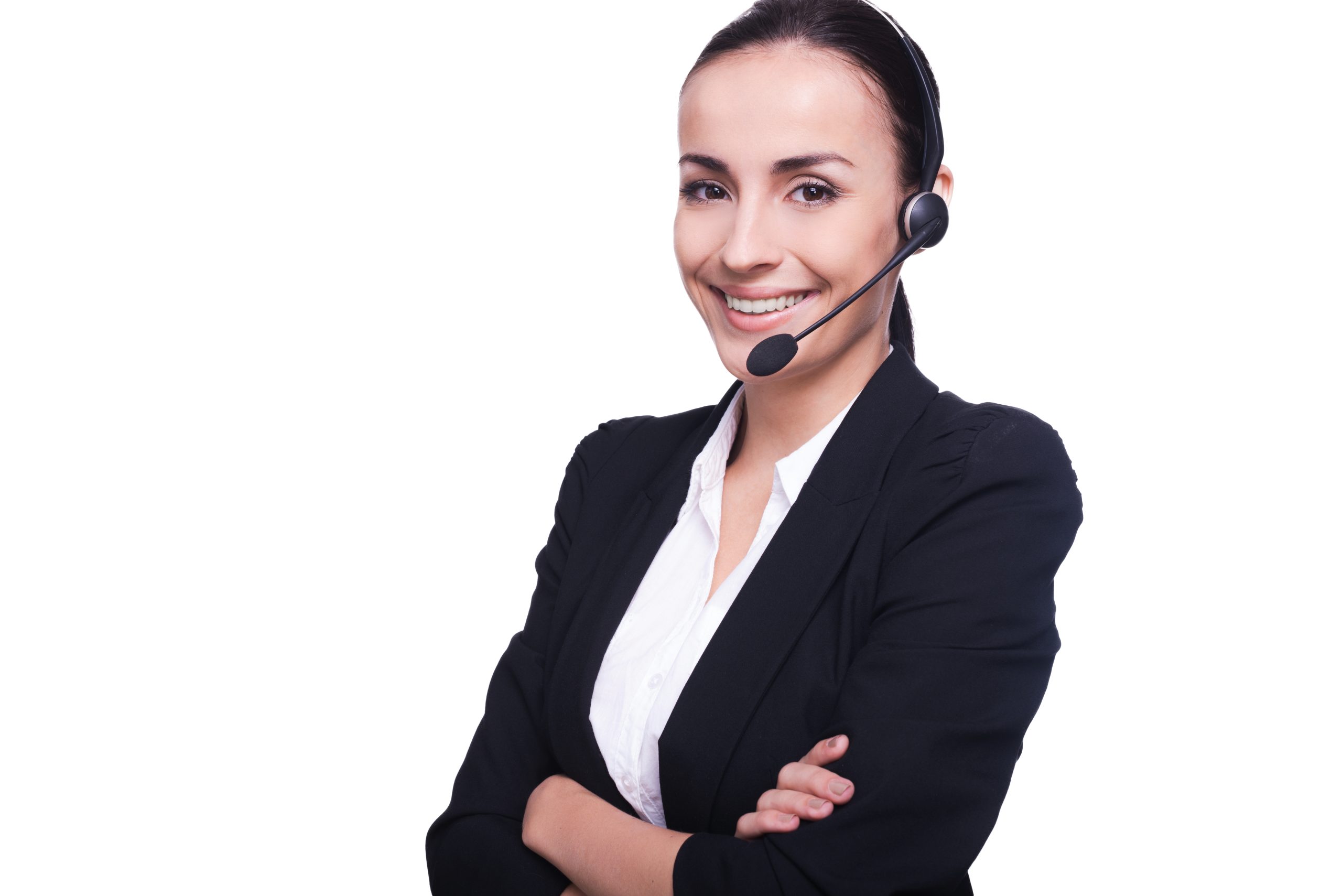 Customer service representative. Confident young woman in headset smiling and keeping her arms crossed while standing isolated on white